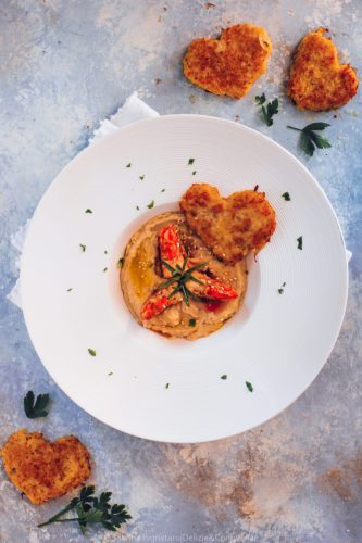 roni a brandy su purea di cannellini e cuori dorati di patate